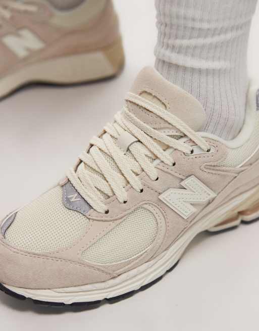 New Balance 2002 trainers in off white