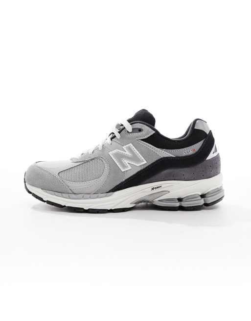 New Balance 2002R sneakers in gray with black detail | ASOS