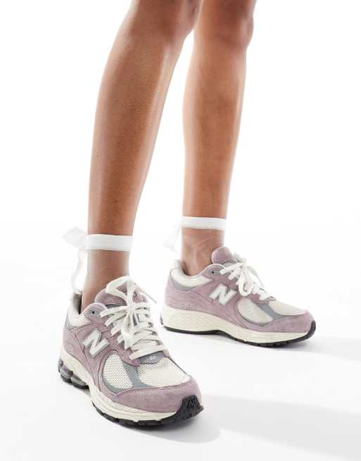 New Balance 2002r unisex trainers in beige and purple | ASOS