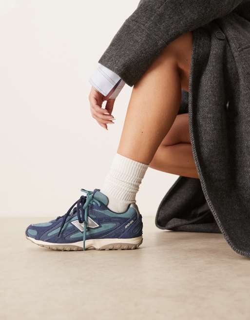 New Balance 204 – Marinblå träningsskor i mocka, 2 av 5