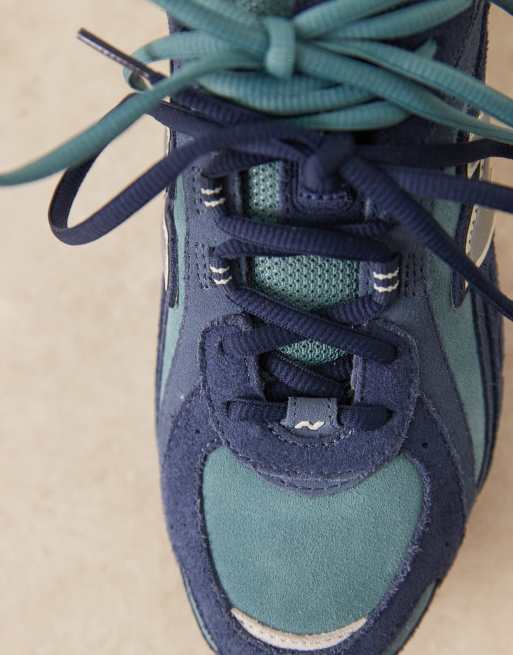 New Balance 204 – Marinblå träningsskor i mocka, 3 av 5