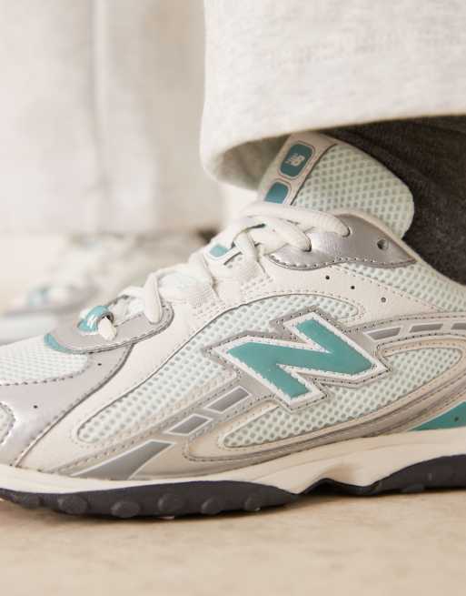 New Balance – 204L – Silvermetalliska och blå träningsskor, 4 av 5