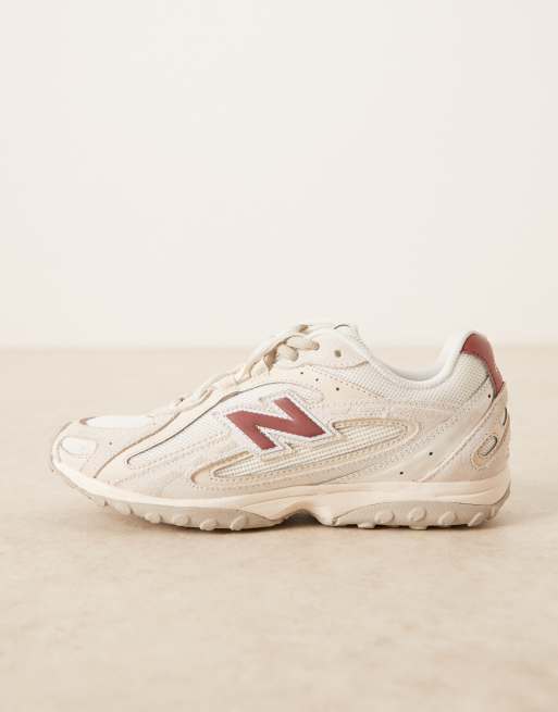 New Balance 204L sneakers in off white and red | ASOS