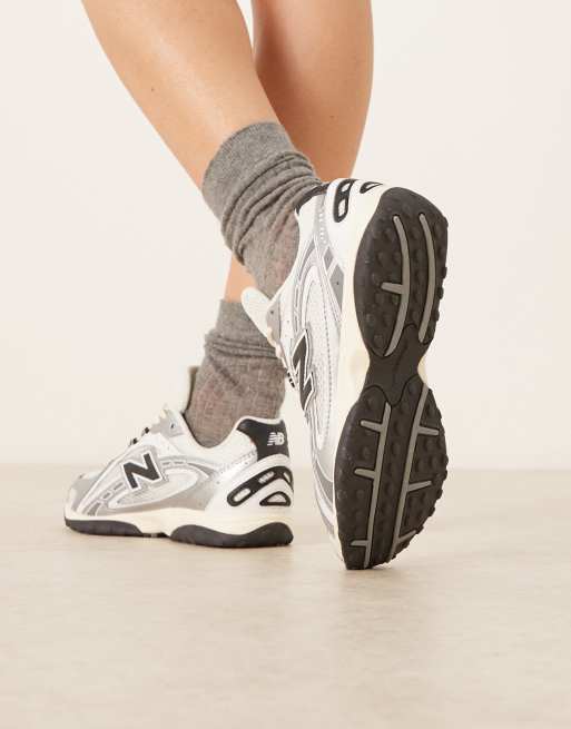 New Balance 204L sneakers in silver and black | ASOS