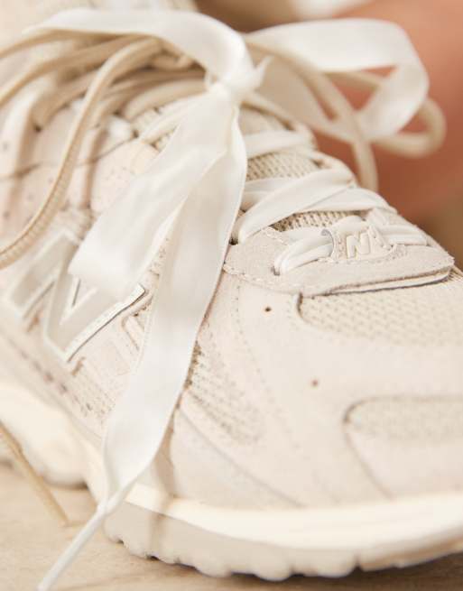New Balance - 204L - Sneakers smerlate color crema, 3 di 5