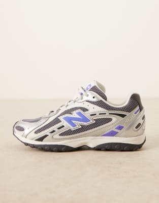 New Balance 204L trainers in silver metallic and indigo