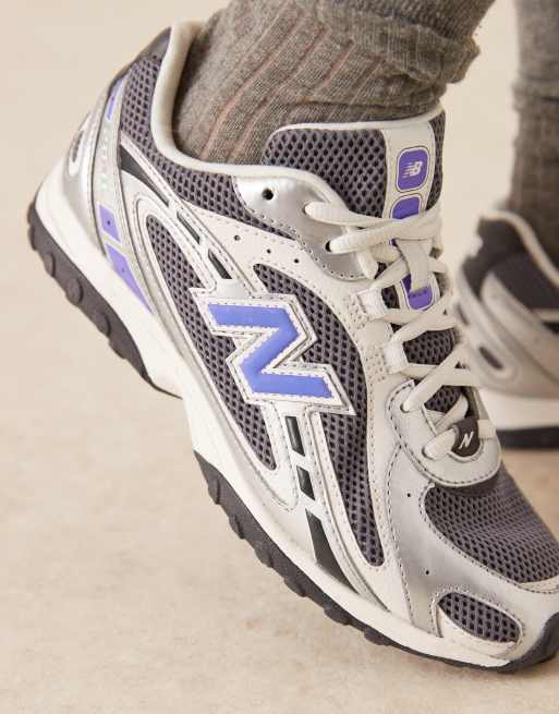 New Balance 204L trainers in silver metallic and indigo, 4 of 5