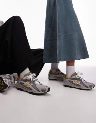  204L unisex trainers in grey and yellow suede