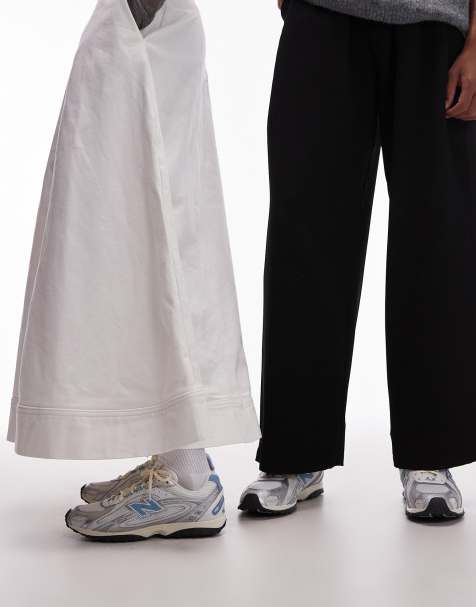 New Balance 204L unisex trainers in white and blue - view 1