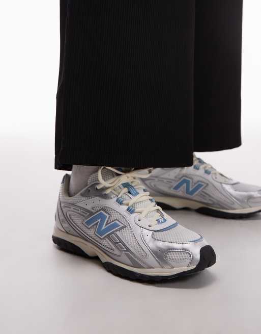 New Balance 204L unisex trainers in white and blue