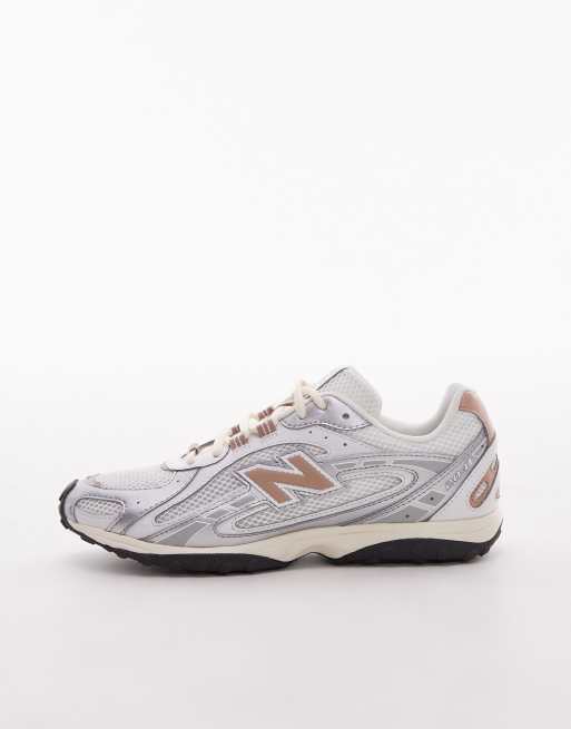 New Balance 204L unisex trainers in white and brown