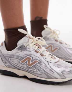 New Balance 204L unisex trainers in white and brown