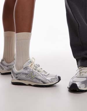 New Balance 204L unisex trainers in white and green
