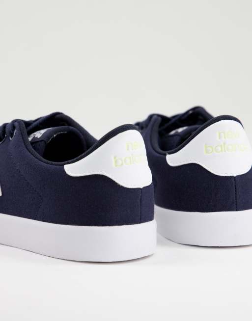 New Balance 210 court sneakers in navy and white, 2 of 4
