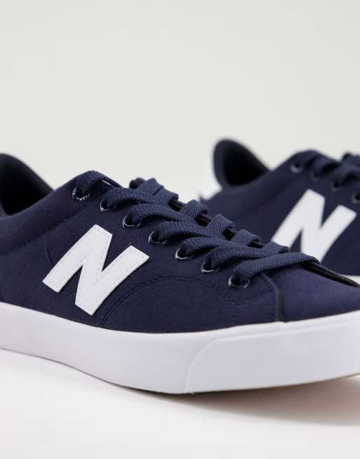 New Balance 210 court sneakers in navy and white, 4 of 4