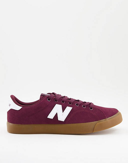 New Balance 210 sneakers in burgundy