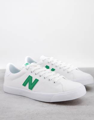new balance 210 trainers in white with gum sole