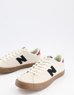 New Balance 210 trainers in white with 
