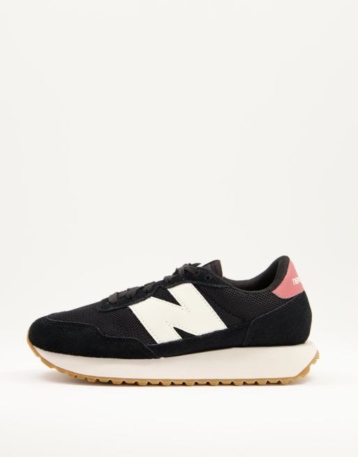 New Balance 237 mesh sneakers in black and cream