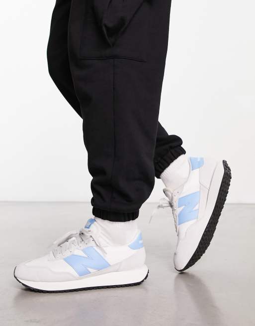 New Balance - 237 sneakers i knækket hvid og blå