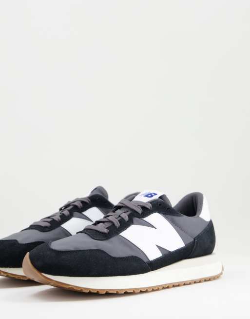 New Balance 237 sneakers in black with gum sole | ASOS