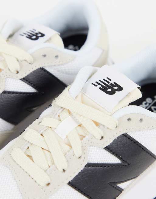 New Balance 237 sneakers in cream ASOS