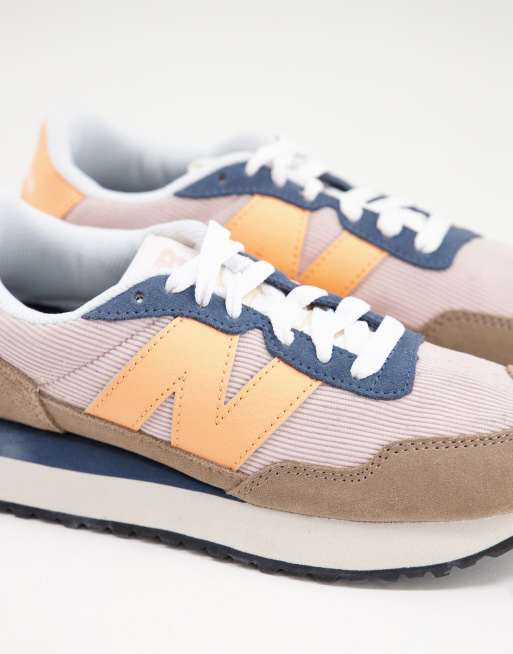 new balance 237 sneakers in light pink and coral