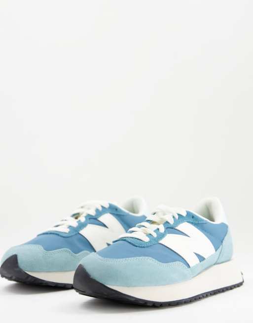 New Balance 237 sneakers in teal