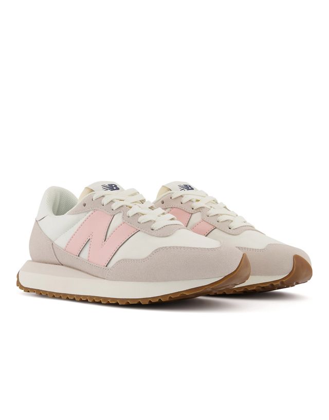 New Balance 237 sneakers in white and pastel pink