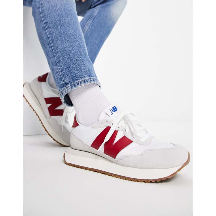 New Balance 237 sneakers in white and red