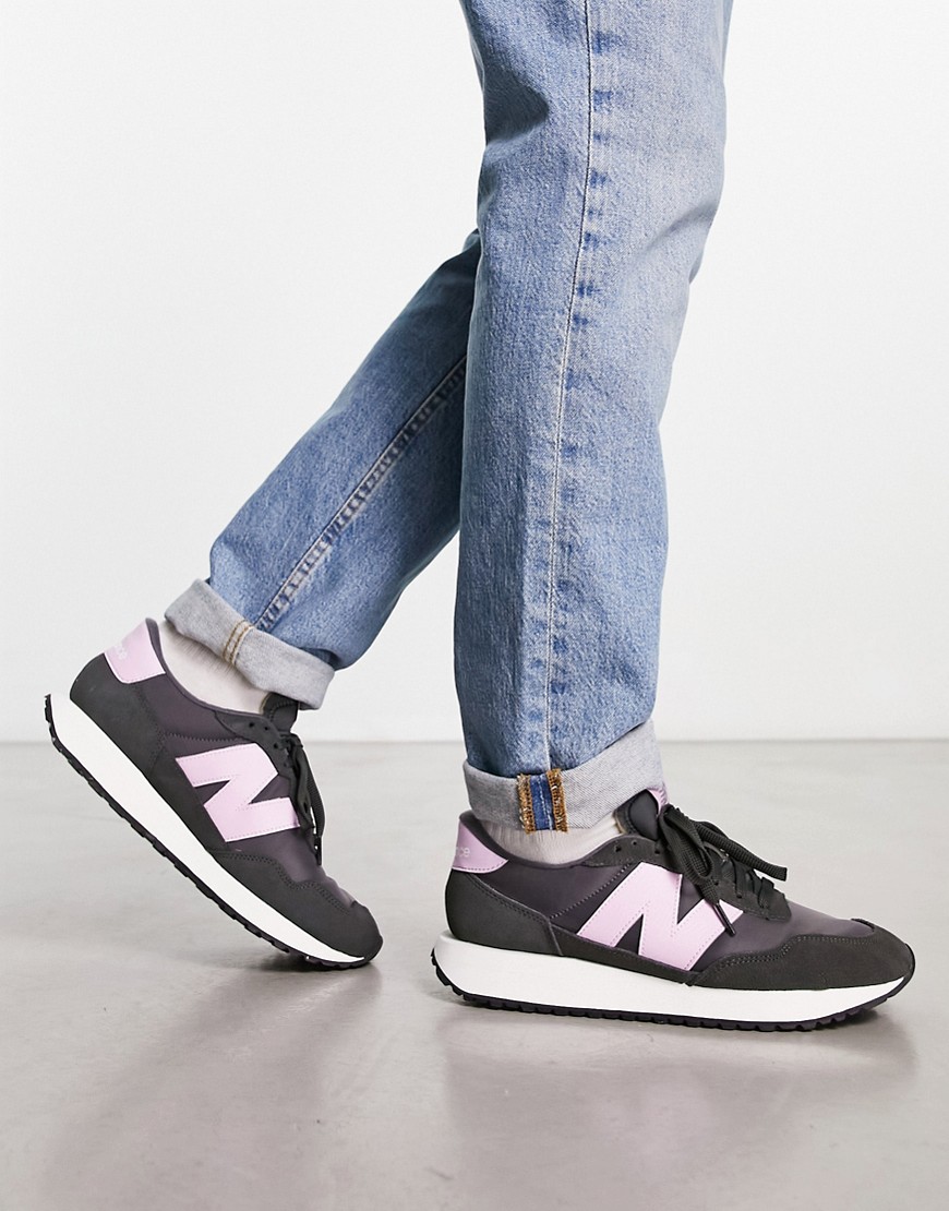 New Balance 237 trainers in black and purple