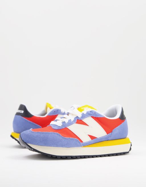 New Balance 237 trainers in blue and orange