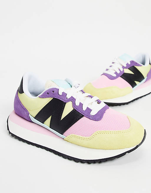 New Balance 237 trainers in colourblock yellow