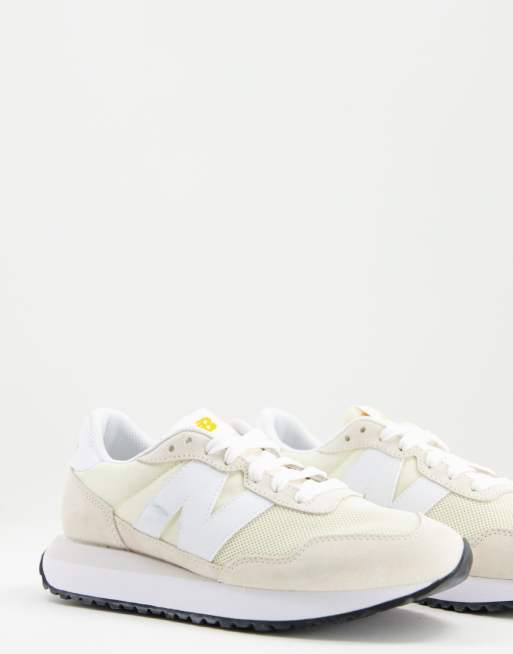 New balance best sale cream trainers