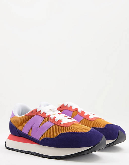 New Balance 237 trainers in purple and orange