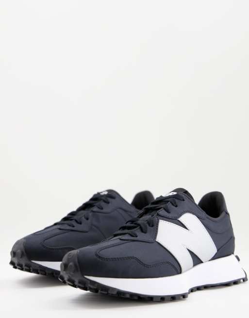 New Balance 327 metallic trainers in black and silver