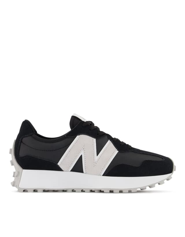 New Balance 327 sneakers in black and white