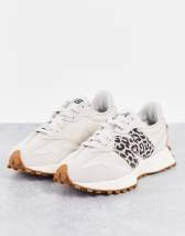 New Balance 1906 sneakers in white with blue and pink details