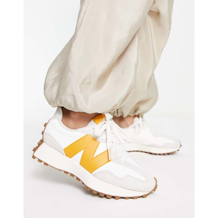 New Balance 327 sneakers in off white with yellow detail