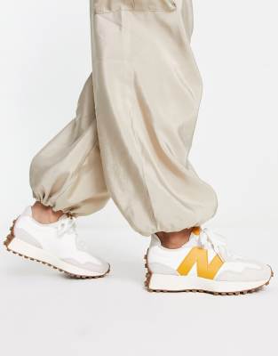 New Balance 327 sneakers in off white with yellow detail