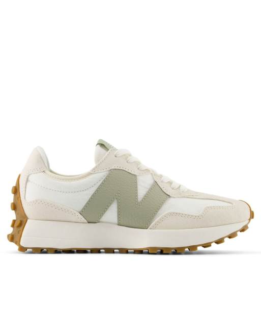 New Balance 327 sneakers in white and beige with light green detail