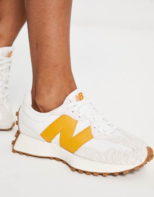 New Balance 327 sneakers in white and yellow with gum sole | ASOS