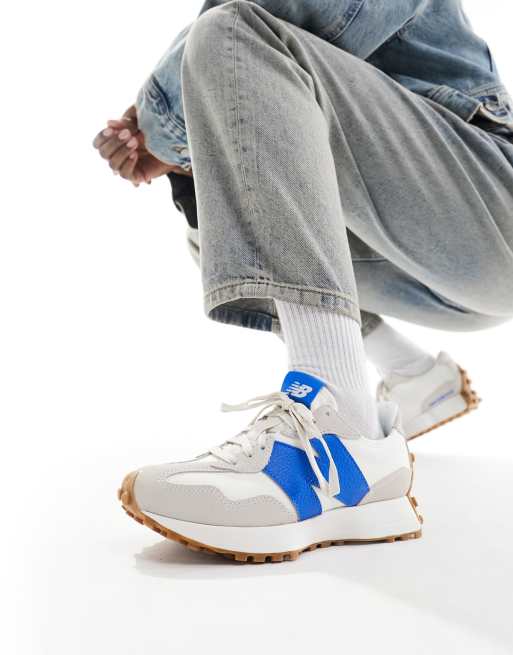 New Balance 327 sneakers in white with blue detail