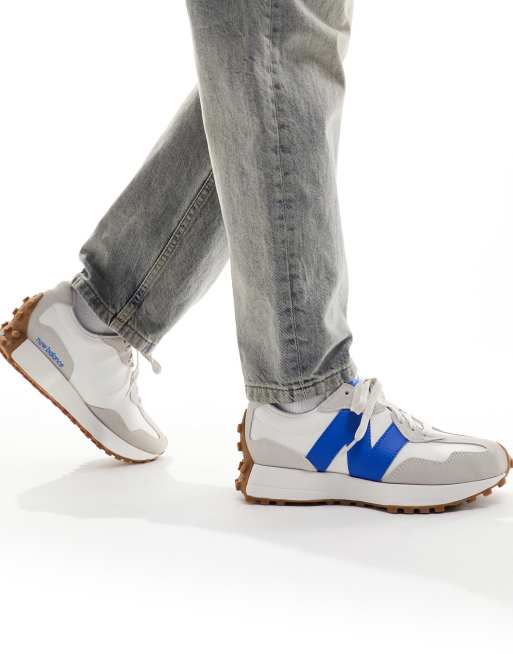 New Balance 327 sneakers in white with blue detail
