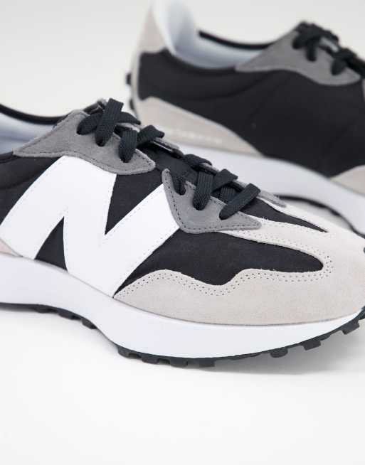 New balance nere hot sale e grigie