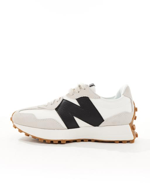 New Balance 327 sneakers with gum sole in white and black
