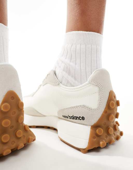 New Balance 327 sneakers with gum sole in white and black