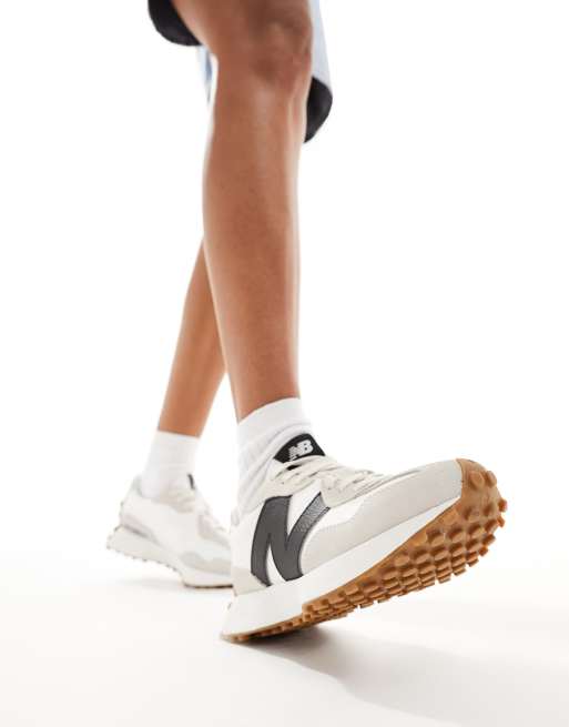 New Balance 327 sneakers with gum sole in white and black