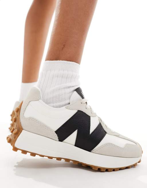 New Balance 327 sneakers with gum sole in white and black