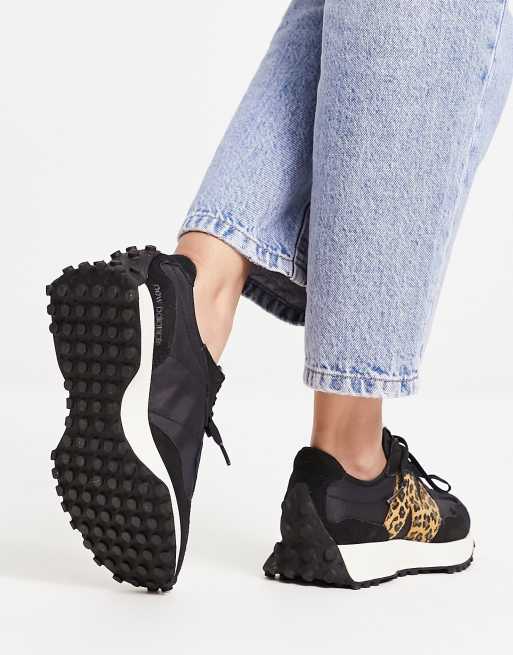 Black and store animal print trainers